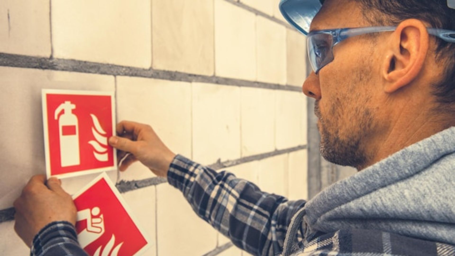 Safety officer inspecting equipment in a commercial property